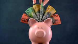Pink Piggy Bank Money Concept On Dark Blue Background
